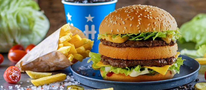 Image with the Fast Food menu with Mega Burger from Hesburger Source Baneasa.ro
