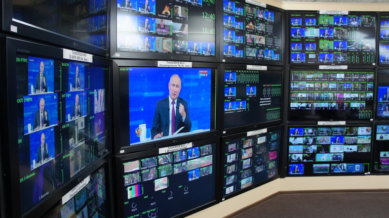 Vladimir Putin on the screens. Illustrative photo