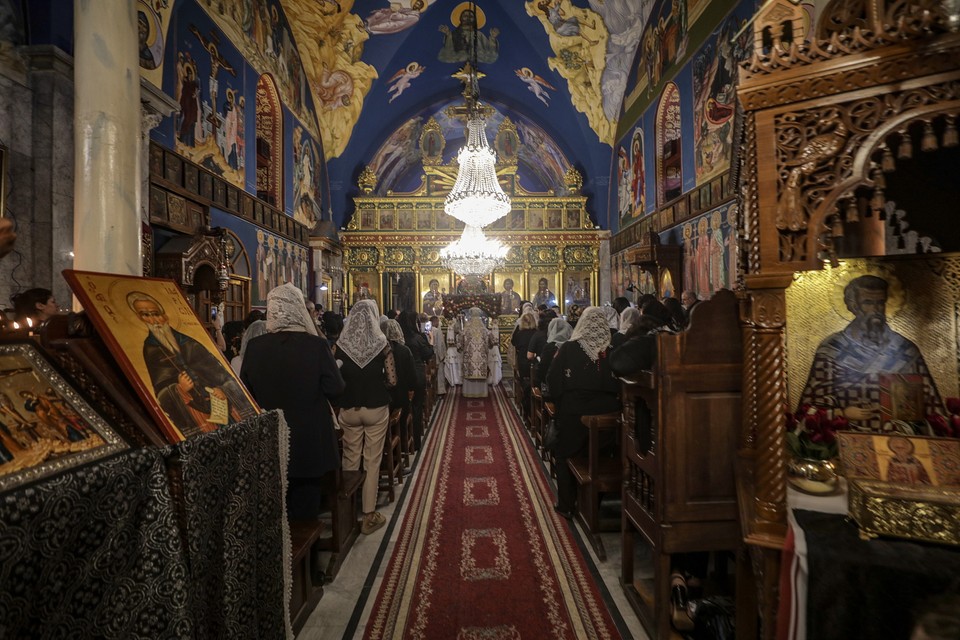 Faithful during the Deny Mass in the Greek Orthodox Church of St. Porfiriosa in the city of Gaza