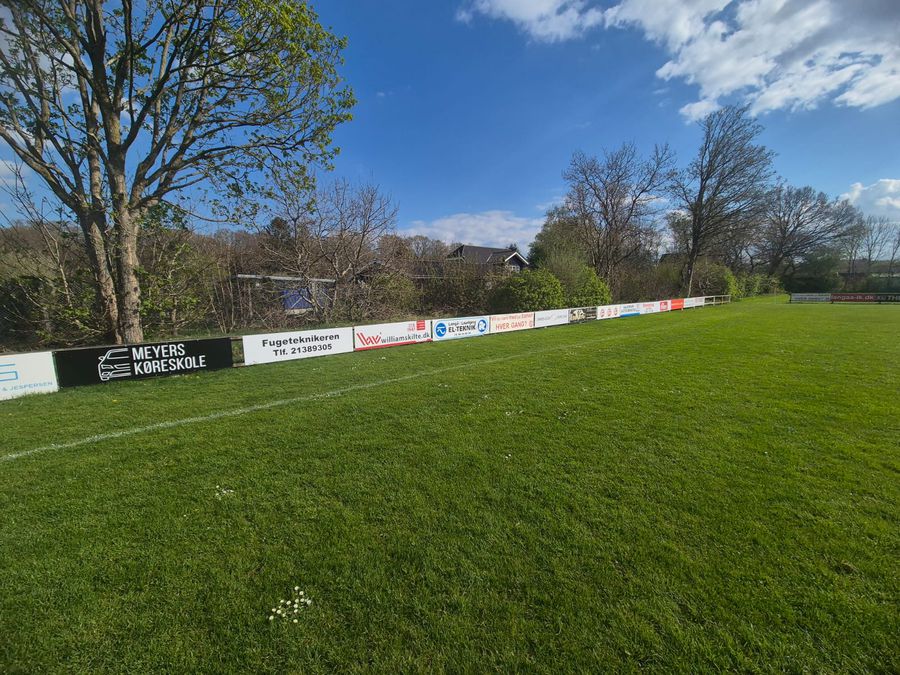 A lot of advertising panels at a The 100% Romanian team from