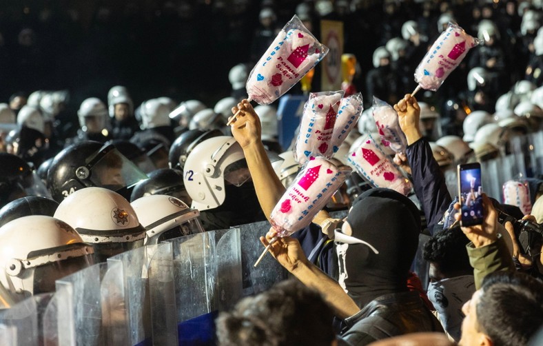Demonstrators show cotton candy of the Turkish police during a protest against the detention of the mayor of the Imamogle, Istanbul, Türkiye, March 24, 2025.