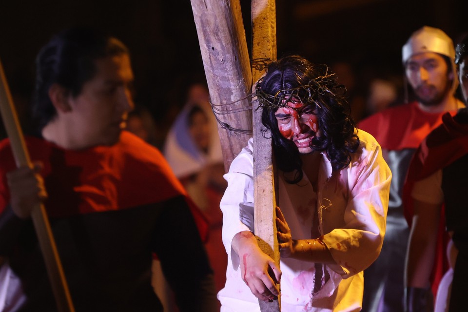 Residents of Villa Armonia, the peripheral district of the city of La Paz in Bolivia during the Way of the Cross