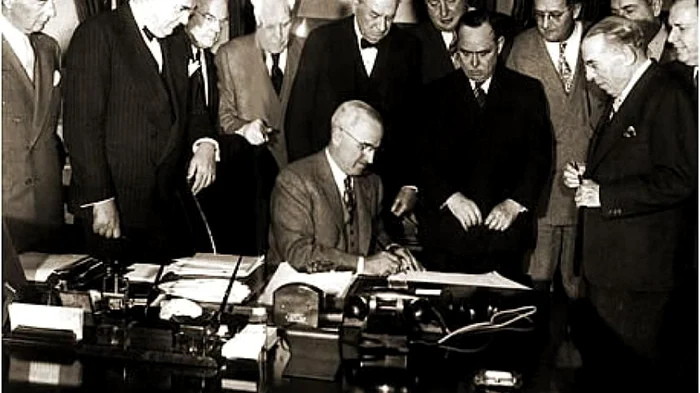 The US President Harry Truman signs the Law on the establishment of the 