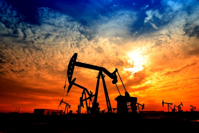 Petroleum probes in the dusk