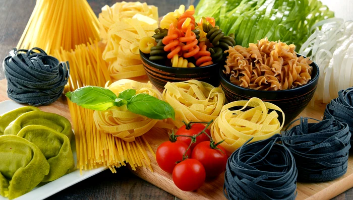 Several types of unprepared pasta artistically arranged on a Bartalent Lab photo table