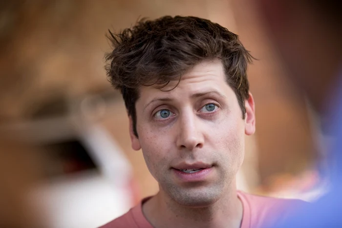 Sam Altman, entrepreneur, billionaire, man, blue eyes, pink shirt