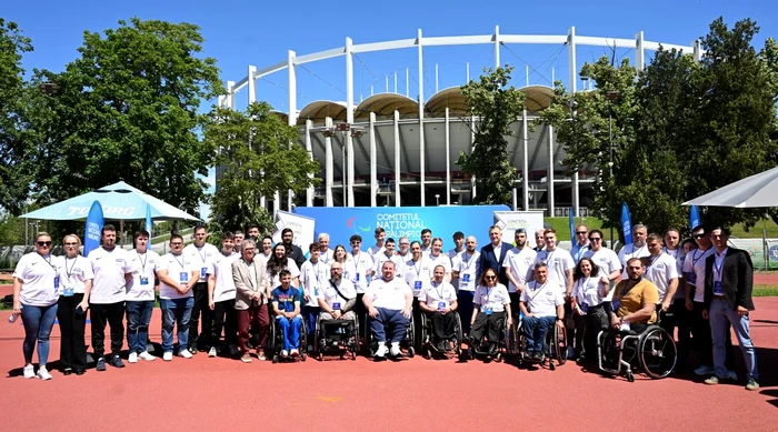 Paralympic athletes in front of the national arena