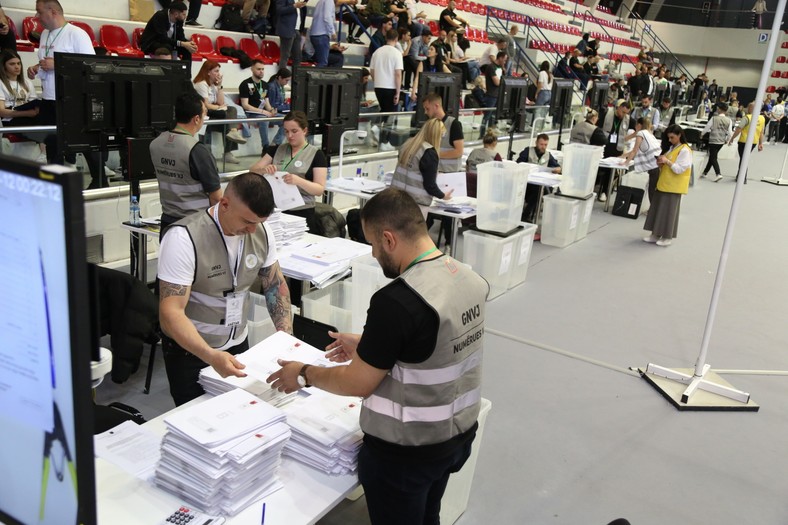 Members of the election committee count votes in the polling station after the parliamentary election in Tirana in Albania, on May 11, 2025.