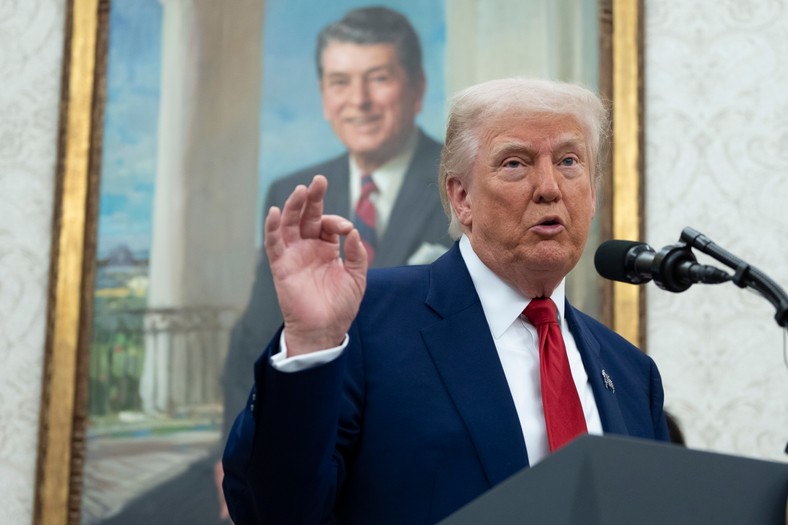 The President of the United States Donald Trump speaks against the background of the portrait of Ronald Reagan in an oval office in the White House in Washington, DC, USA, May 28, 2025.