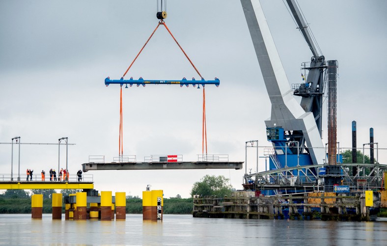 Works on a damaged section of the railway bridge on the Hunte River