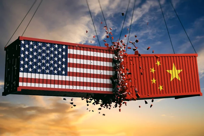 Suggestive image of two containers painted in Chinese and US flags colliding mid-air