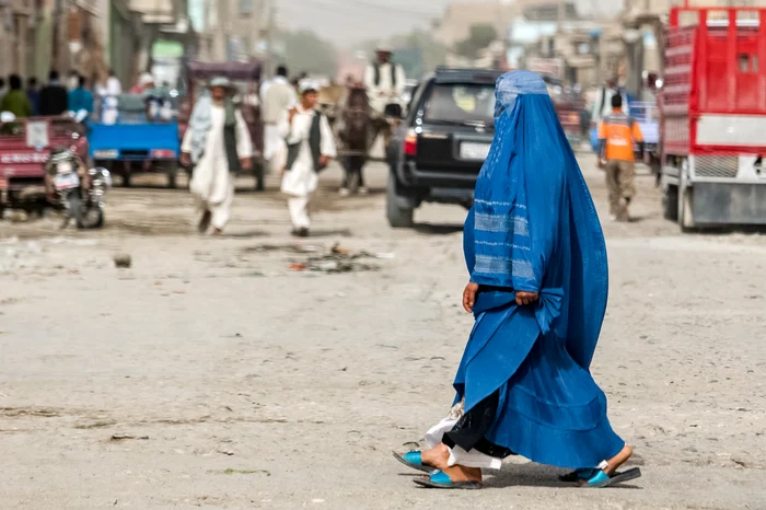 Afghane women wearing burka to the Kabul photo shutterstock