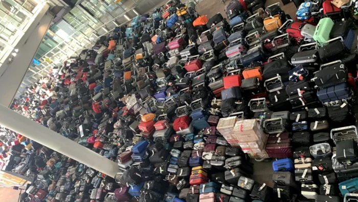 Hundreds of luggage at an airport