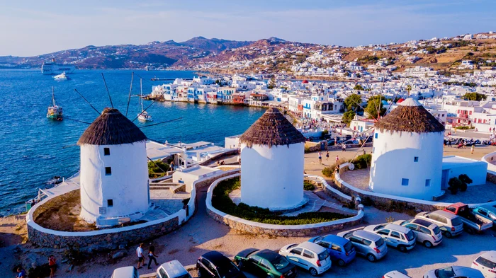 Wind mills on mykonos island photo shutterstock