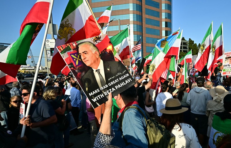 Demonstrators wave the poster of Pahlaw's response during the Congregation calling for the change in the regime in Iran, after the US President Donald Trump announced the suspension of weapons, Los Angeles, USA, June 23, 2025.