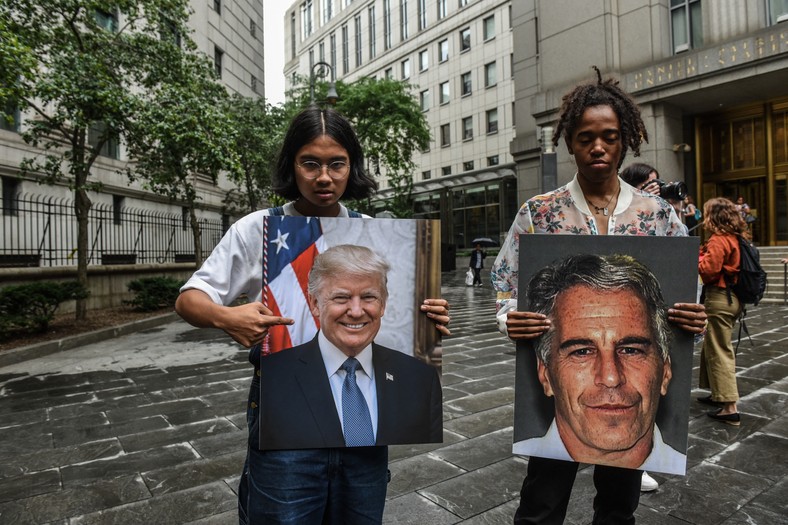 Protesters with banners with images of Jeffrey Epstein and President Donald Trump in front of the Federal Court building in New York, July 8, 2019.