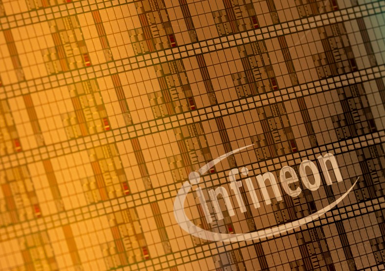 A semiconductor model with the logo of the German company Infineon dealing with the production of electronic components, Neubiberg, Germany, November 12, 2024.