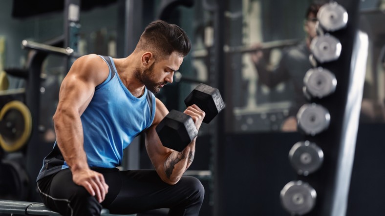 A man exercising with a dumbbell (illustrative photos)