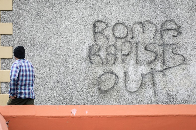 Graffiti with the inscription "Roma rapists out" ("Down with Roma rapists") after the second night of an anti -immigrant demonstration in Ballymena, Northern Ireland, June 11, 2025.