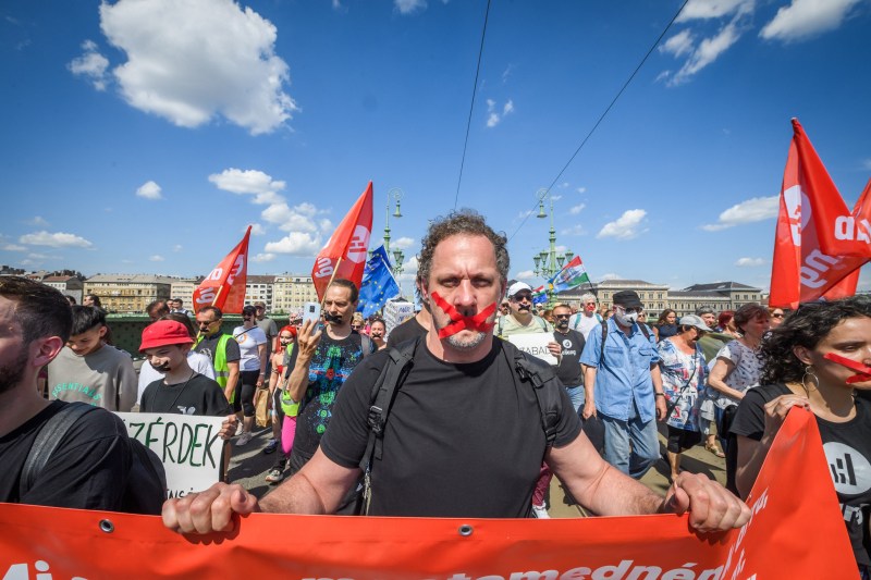 Thousands of people silently protested in Hungary against the law targeting the media and NGOs