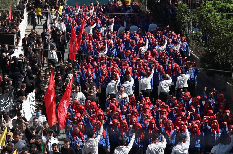Supporters of Hezbollah celebrate the Ashura Day in Beirut, Lebanon, July 6, 2025. Shiite Muslims around the world celebrate the holy month Muharram, the first month of the Islamic calendar, whose culmination is the feast of Ashura commemorating the martyrdom of Imam Husajna, grandson