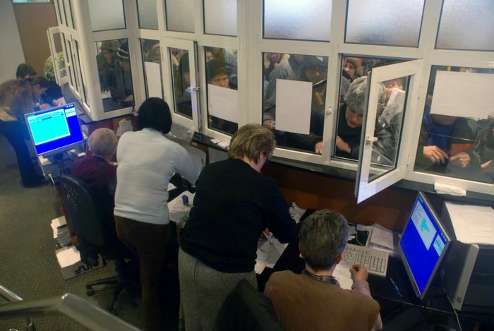 Civil servants behind a counter
