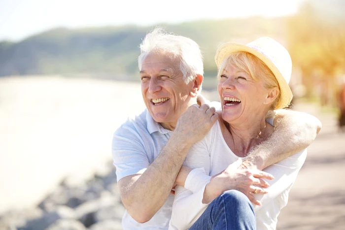 Couple of pensioners full of good mood and vitality on the edge of a shutterstock photo