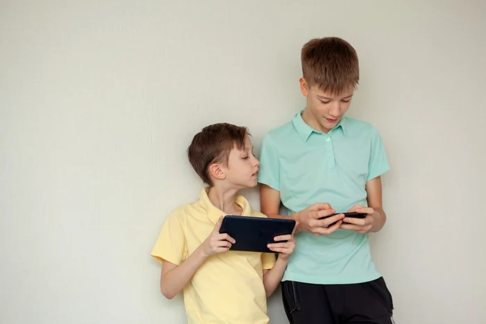Two children, tablets