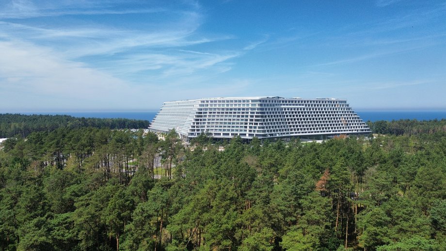 The hotel is surrounded by a dense forest