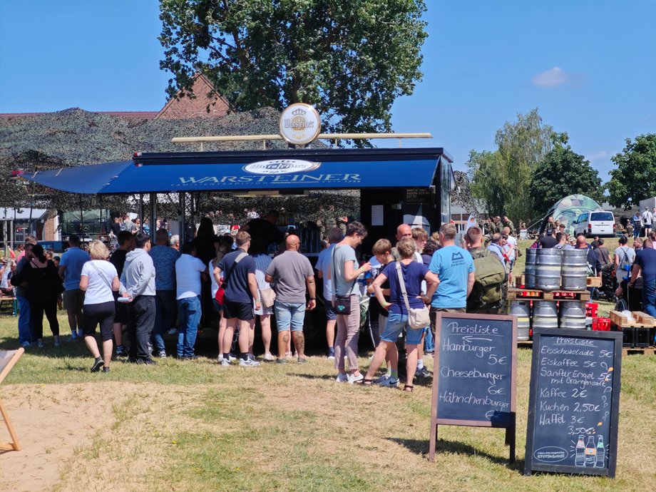 Queue under the beer booth