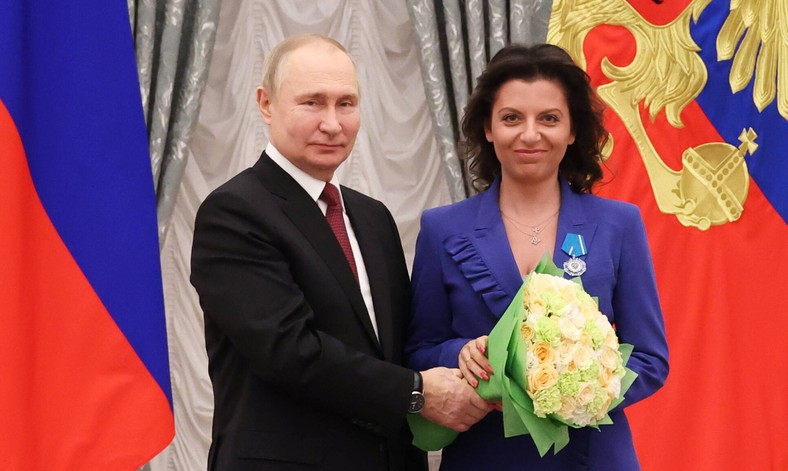 Russian President Vladimir Putin hands the order "For merits for the homeland" editor -in -chief of the RT Station Margarit Simonian. Moscow, December 20, 2022