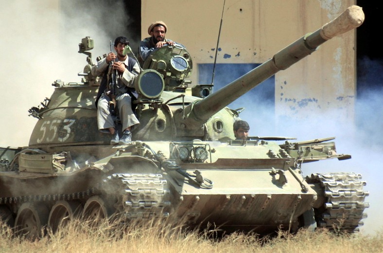 A tank of Afghan forces of the northern coalition on the front line against the Taliban at the former main air base of the USSR in Bagram, 25 km north of Kabul, Afghanistan, September 25, 2001.