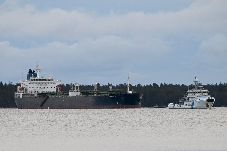 The ship of the Finnish coastal guard (P) and tanker Eagle S anchored near the Port of Kilpilahti in Porvoo, in the Gulf of Finnish, December 30, 2024.