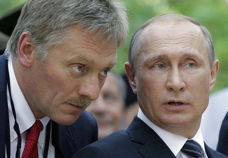 Dmitri Peskov with Vladimir Putin, photo: Willwest News / Profimedia Images
