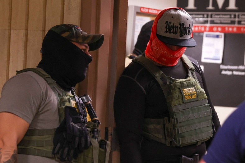Masked federal agents in front of the building of the Immigration Court in Jacob K. Javits Federal Building in New York, USA, July 14, 2025.