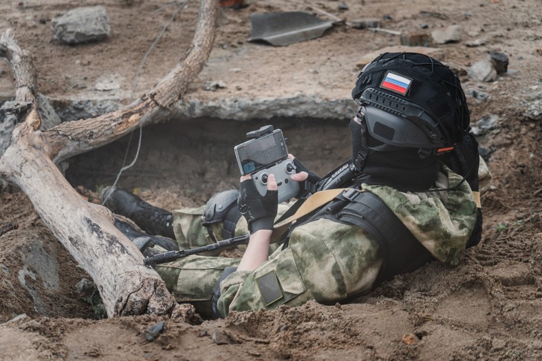 Russian soldier driving a drone (illustrative photos)