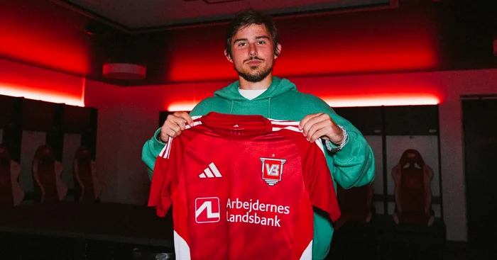 Alexi Pitu, with the T -shirt of his new band