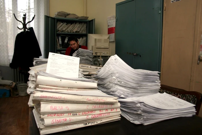A faeie at the end of an office full of files