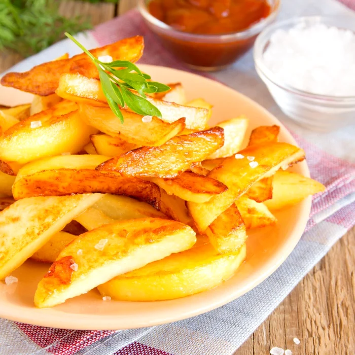 Plain with a generous portion, appetizing fried potatoes coarse photo photo the bossy kitchen
