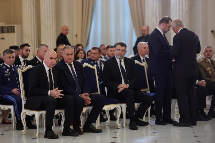 Bolojan at the funerals for Ion Iliescu Photo: Mediafax