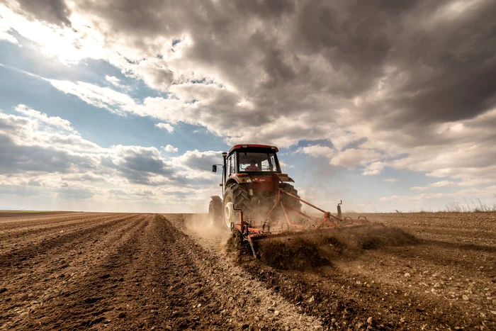 A tractor showed the drought burned land