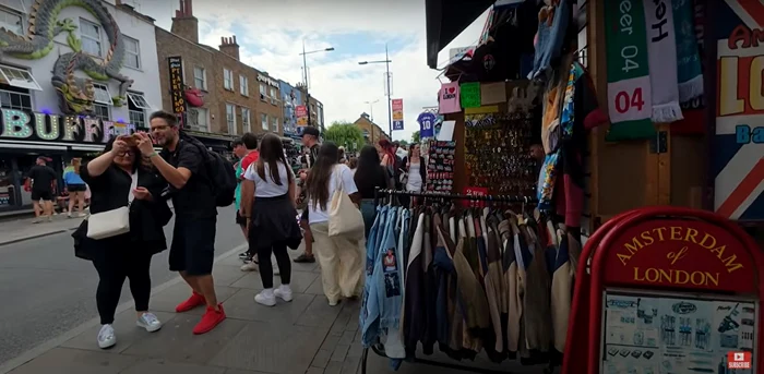 Romanians from the UK buy counterfeit clothes from Camden. Video capture