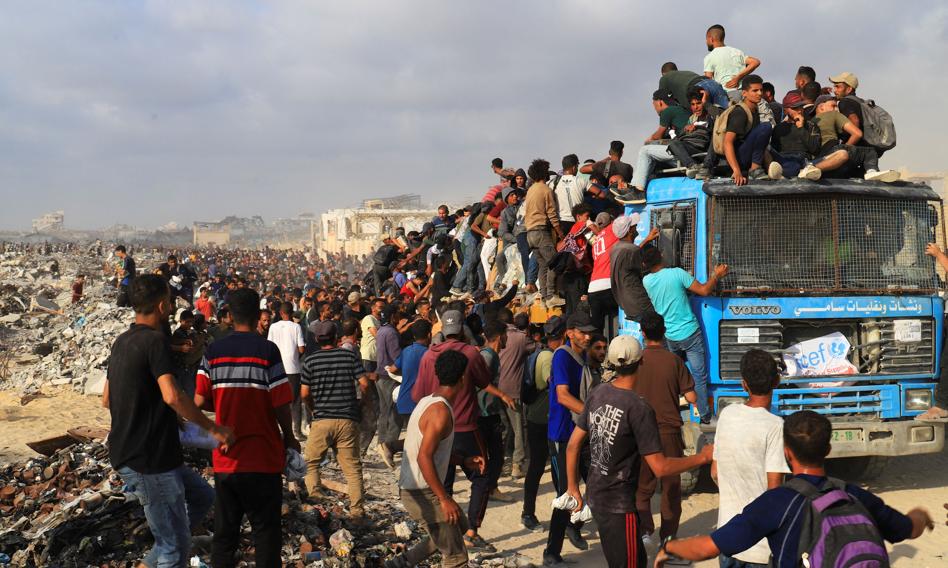 Next killed from a queue waiting for food in the Gaza Strip