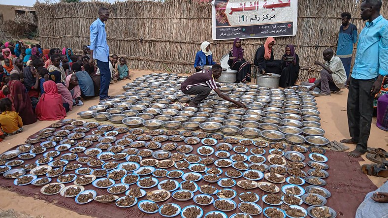 Distribution of humanitarian aid in Al-Faszir, Sudan, August 11, 2025.