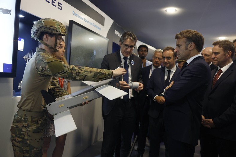 French President Emmanuel Macron and CEO of Thales Group Patrice Caine during the 55th edition of the International Air Salon in Paris, June 20, 2025.