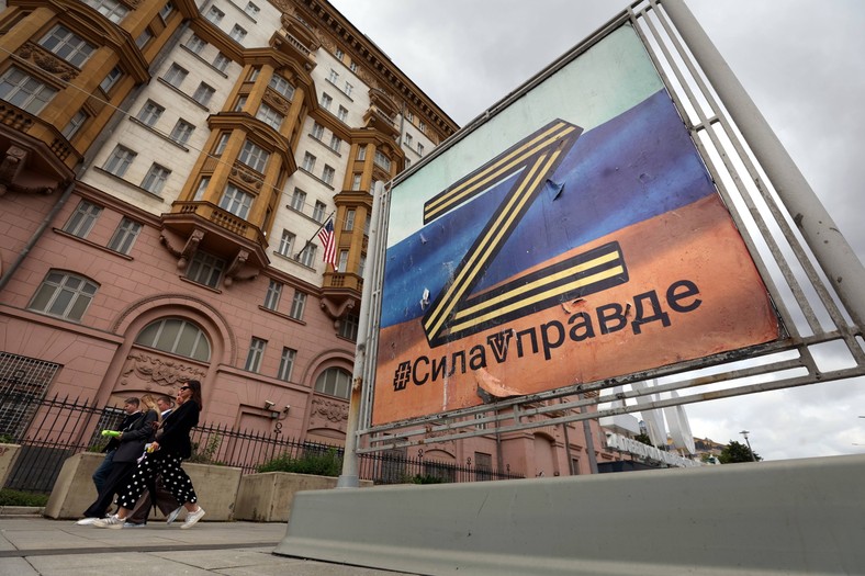 Poster depicting the symbol of the Russian army "WITH" and with an inscription "Strength in truth" In front of the main building of the United States Embassy in Moscow, Russia, August 14, 2025.