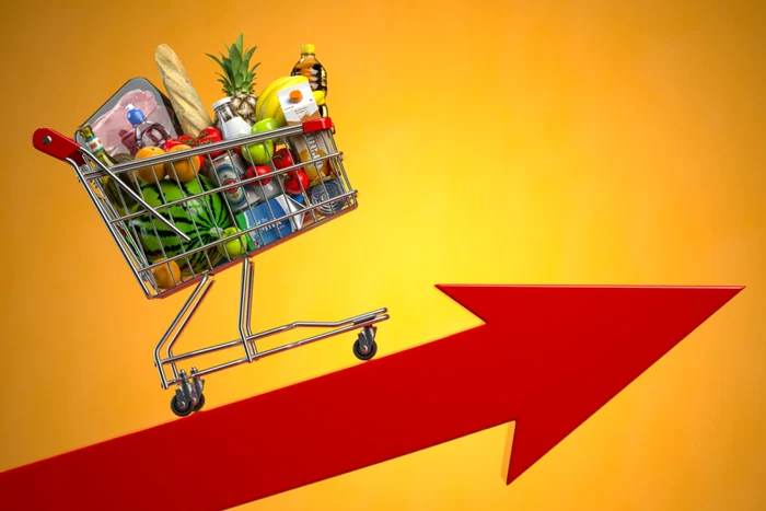 A shopping cart full of foods that climbs on a red arrow suggesting inflation