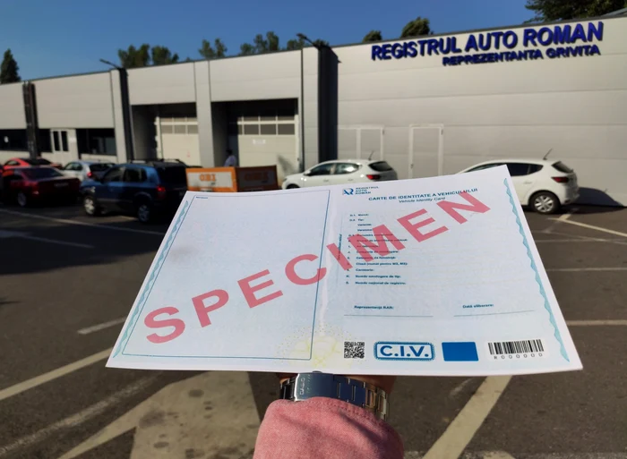 Someone shows the car's identity card in front of RAR headquarters