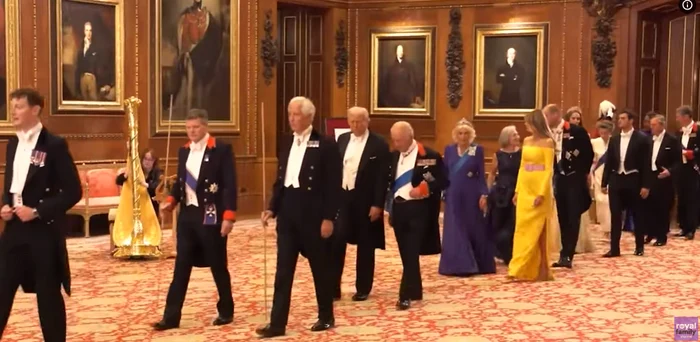 The outfits were on the way of the event. Photo Capture YouTube the Royal Family Channel