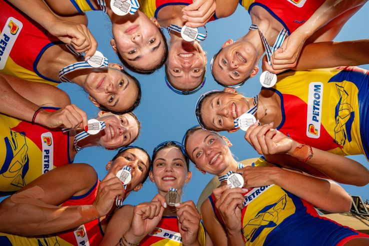 The crew of Romania of 8 plus 1 female frames, silver at CM 2025 photo: FR Rowing/Balint Czucz